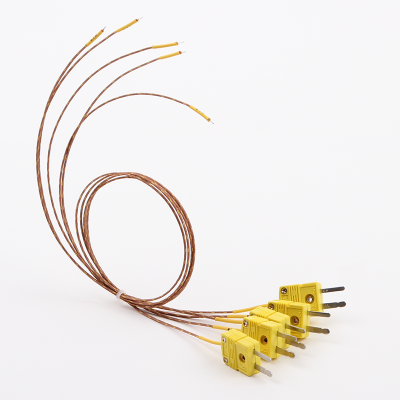 Contact exposed glass fiber thermocouple